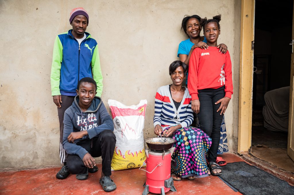 Family using a cookstove in Zambia. Photo: Jason J Mulikita