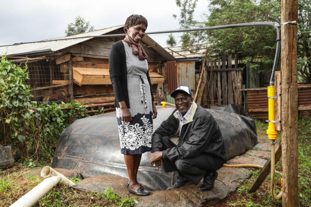 Photo: A family in a rural village in Zimbabwe receiving biogas for cooking from a biodigester – Lanforce Energy