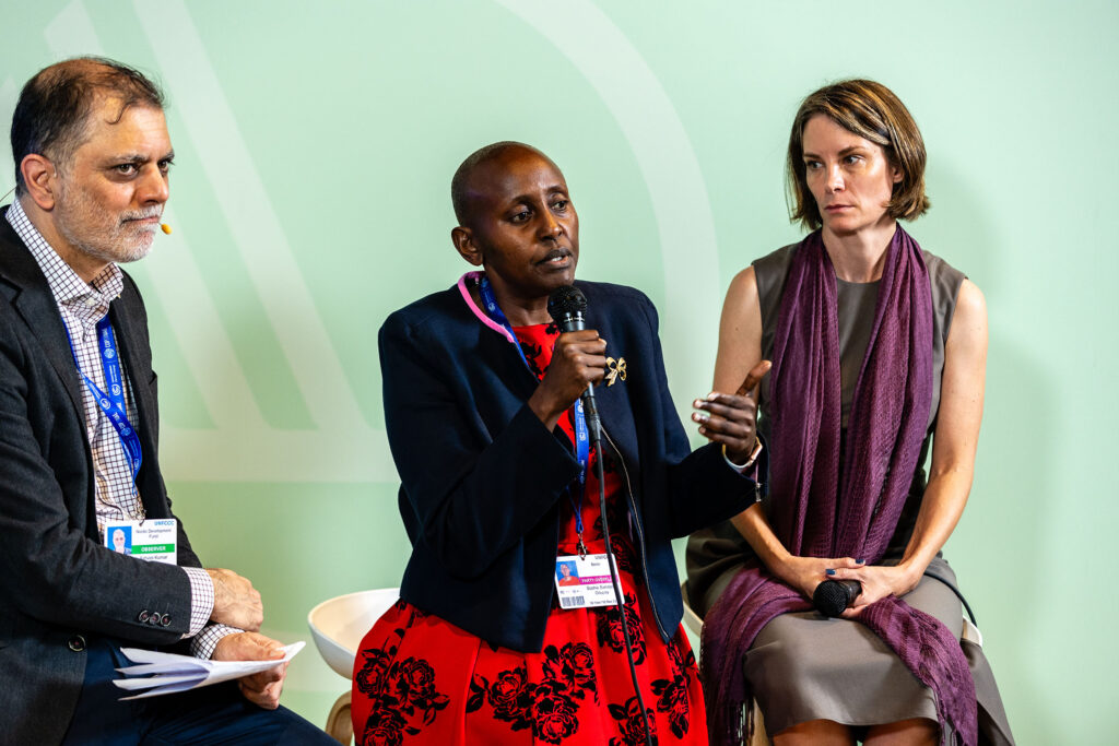 Photo: Ash Sharma, Nefco; Sophie Odupoy, KOKO Networks; Donee Alexander, Clean Cooking Alliance at the MCFA event on 4 Dec 2023 at the Nordic pavilion – Joel Sheakoski for MCFA