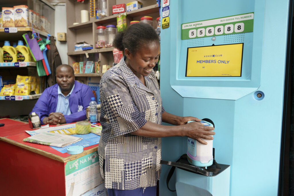 A KOKO customer in Nairobi buys fuel at her local KOKO Agent shop